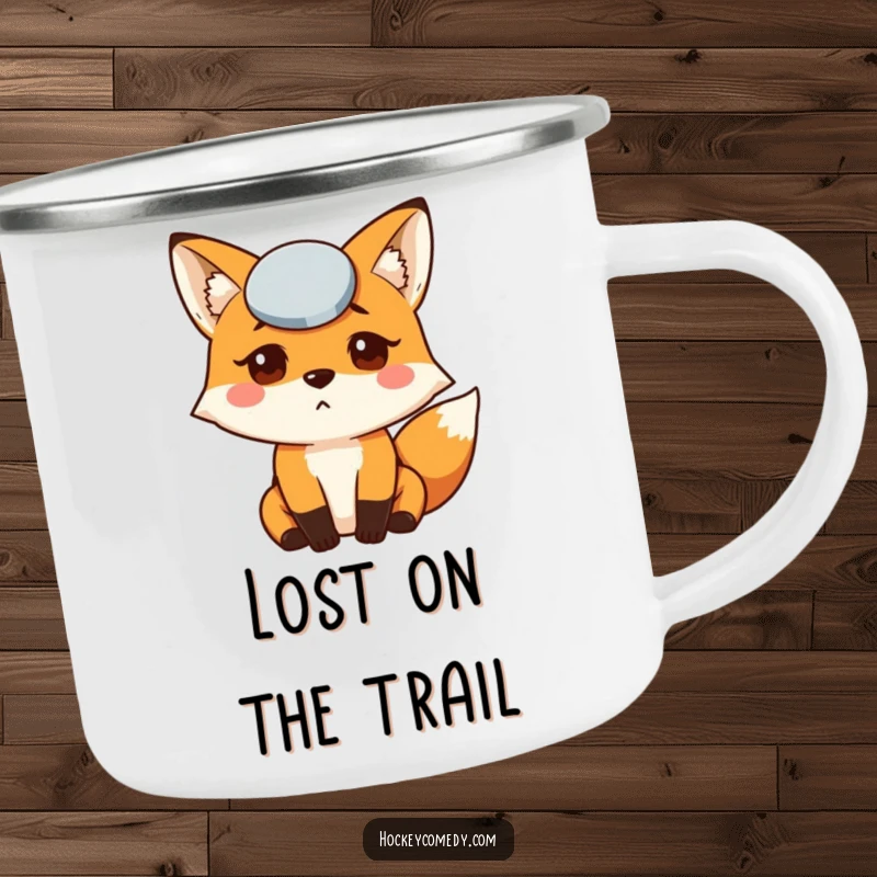 Funny Fox Puck Camping Mug featuring a bewildered fox with a hockey puck on its head, perfect for enjoying drinks outdoors.