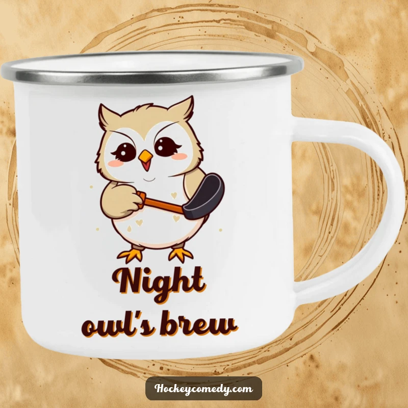 Funny Camping Mug with a giggling owl comically attempting to catch a hockey puck, ideal for outdoor enjoyment and playful sips.