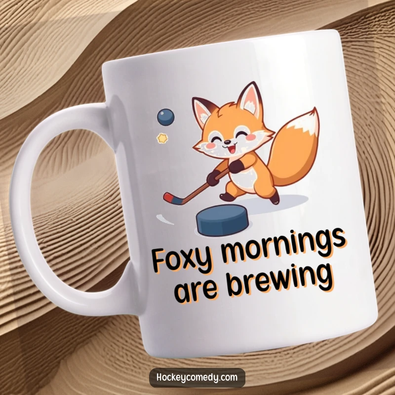 Funny mug depicting a cheerful fox in mid-slap shot, with the hockey puck hilariously veering slightly off target, showing playful determination.