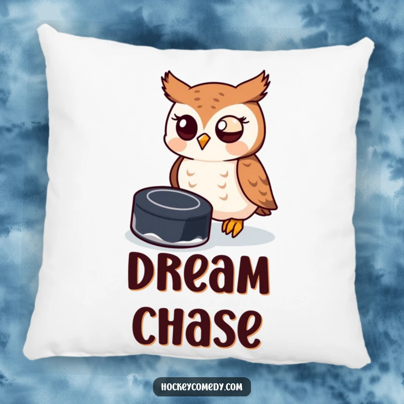 Funny owl trying to catch a hockey puck on a decorative pillow, offering comfort and sports humor.