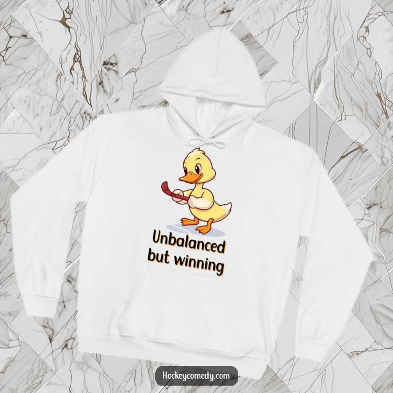 Funny hoodie: A determined duck attempts a slap shot, looking comically unbalanced on the ice, exuding effort and humor.