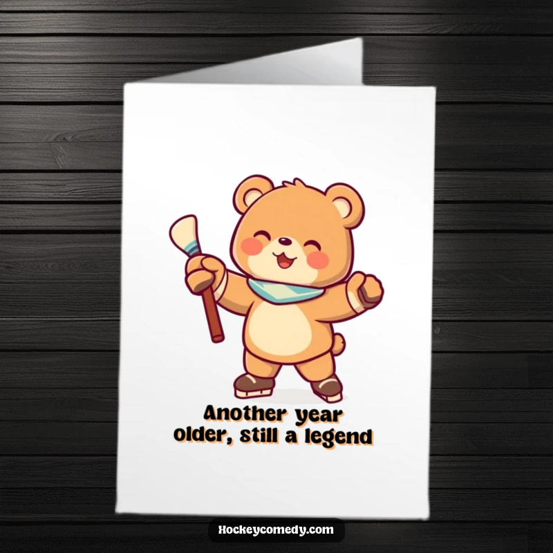 Funny Free Printable Birthday Card: Joyful bear in hockey pose, stick raised, ready to score a birthday wish.