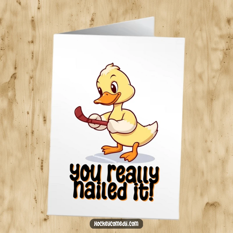 Funny Free Printable Congratulations Card: Determined duck player winds up for a slap shot, celebrating a big win.