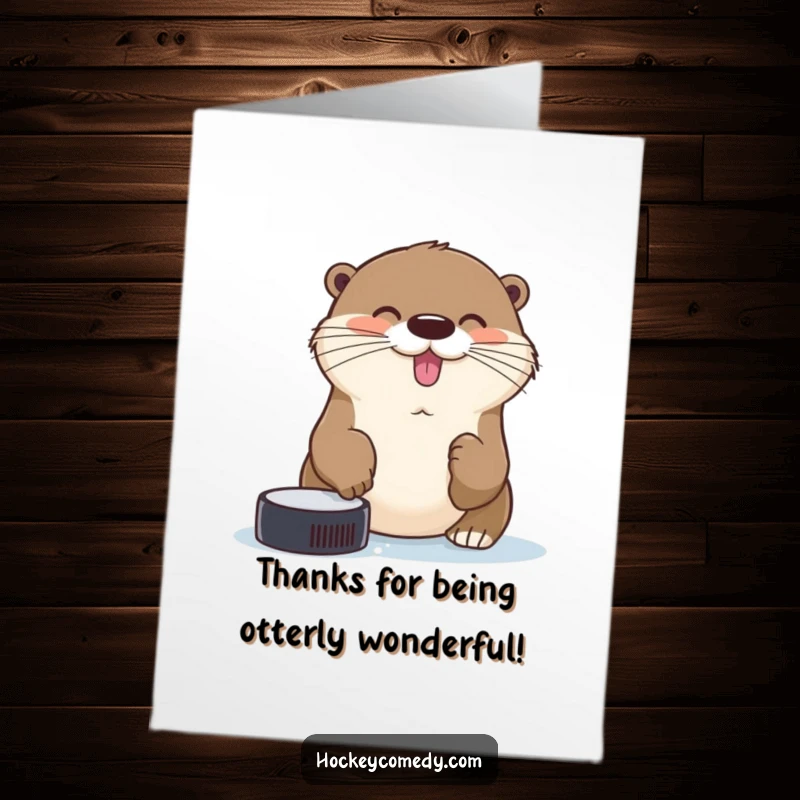 Funny Free Printable Thank You Card: A cheerful otter uses its nose to catch a puck, conveying thanks playfully.