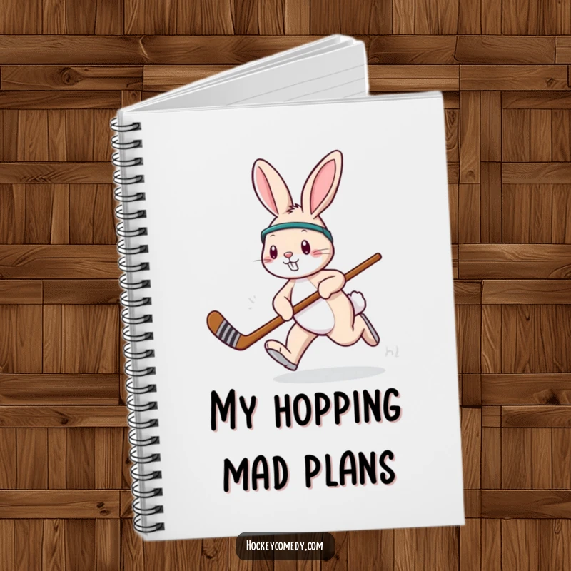 Funny rabbit hockey notebook, showing a playful rabbit hopping with a hockey stick, perfect for jotting notes.