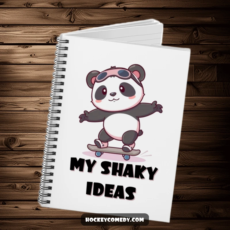 Funny playful panda attempting to skate with wobbly legs on the cover of a humorous notebook.