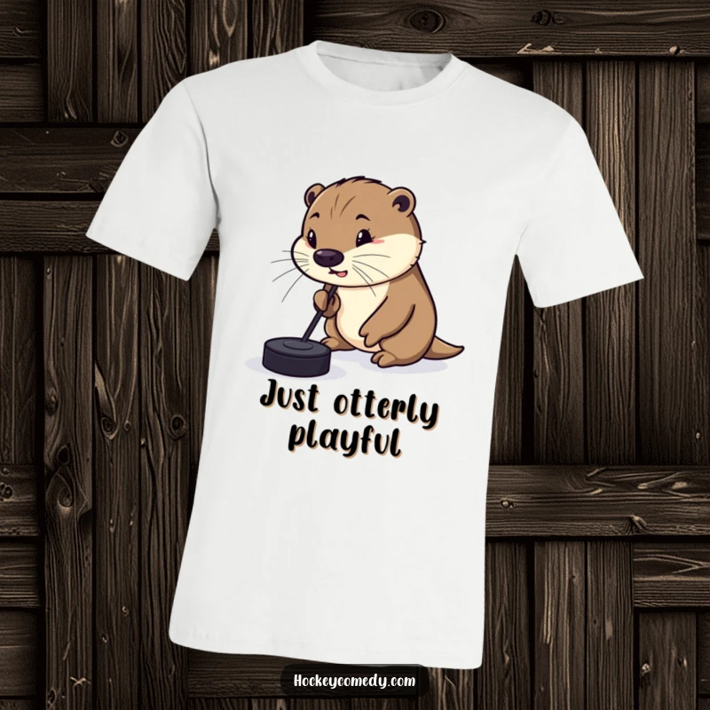 Funny T-Shirt depicting a silly otter comically attempting to dribble a hockey puck with its nose, radiating playful energy and charm.