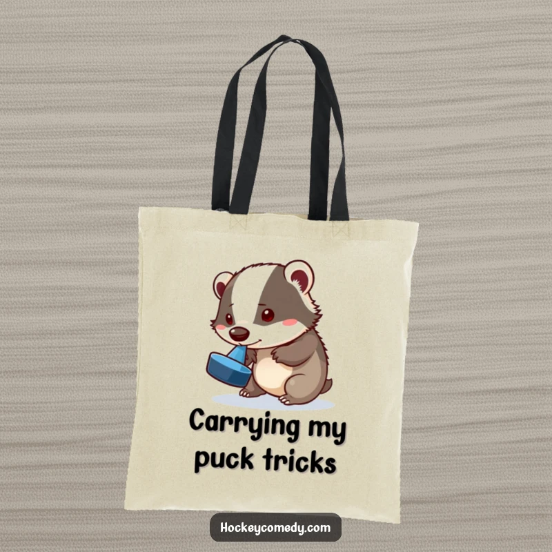 Funny badger tote bag, a playful badger attempting a puck flip with its nose, practical and humorous, ideal accessory gift.
