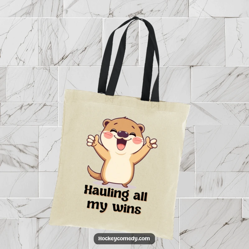 Funny tote bag featuring a jubilant otter striking a hilarious victory pose after scoring a goal, perfect for celebrating wins in style.